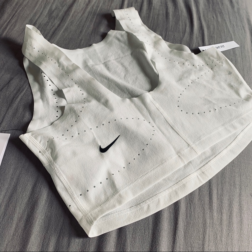 Nike women’s tech pack training crop top.